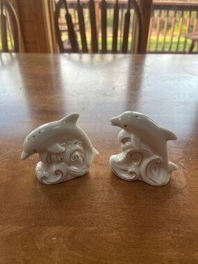 Lenox Jumping Dolphins salt and pepper set. 24K gold trim